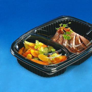 Vaschetta di plastica base nera con due scomparti e coperchio trasparente piena di cibo